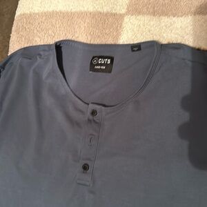 Cuts Clothing Long Sleeve Henley,  White is Elongated Hem,  Blue is Curved Hem